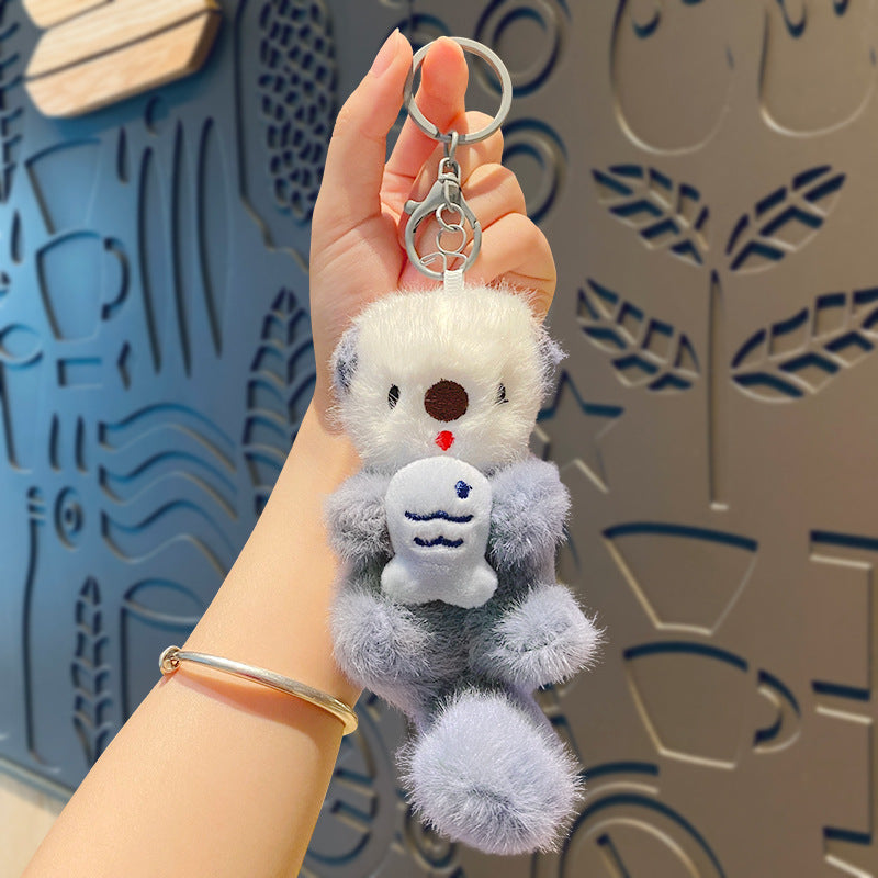 Cute cartoon plush sea otter key chain pendant creative doll doll bag hanging couple small gifts